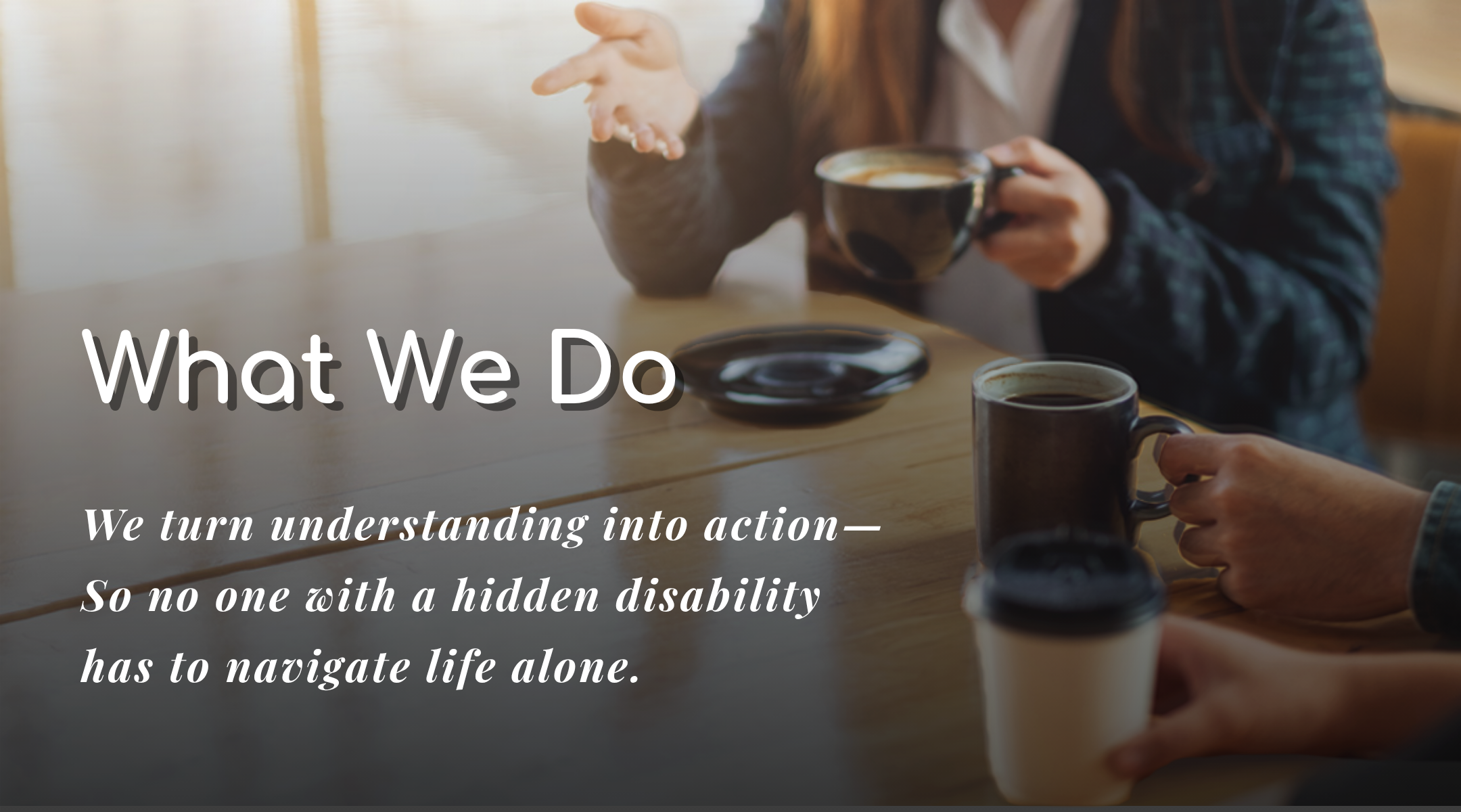 People having inclusive coffee discussion, promoting understanding and support for hidden disabiliti.